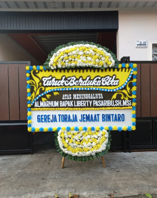 Papan Bunga Duka di Puring Kencana